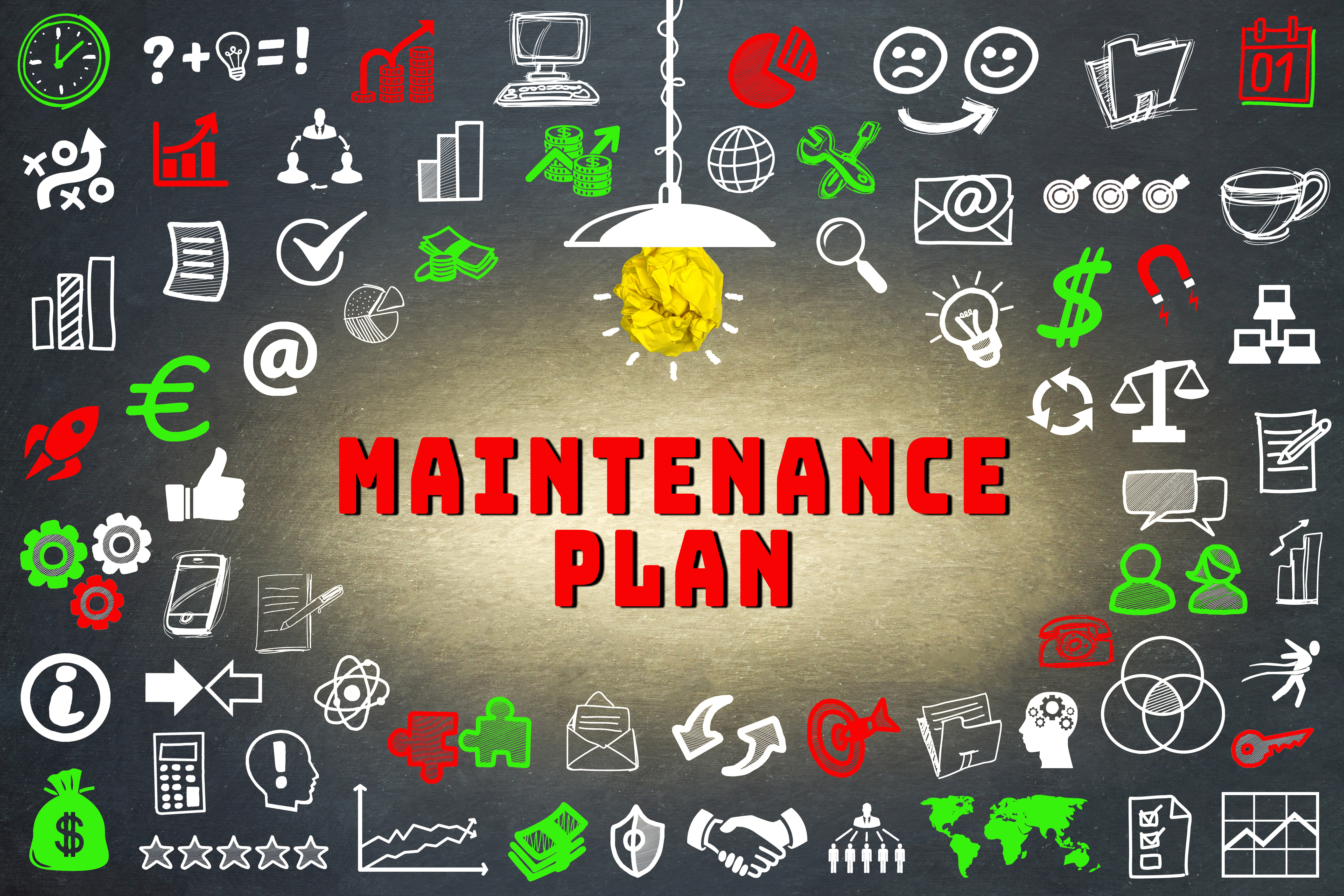 A chalkboard with the words maintenance plan written in red.